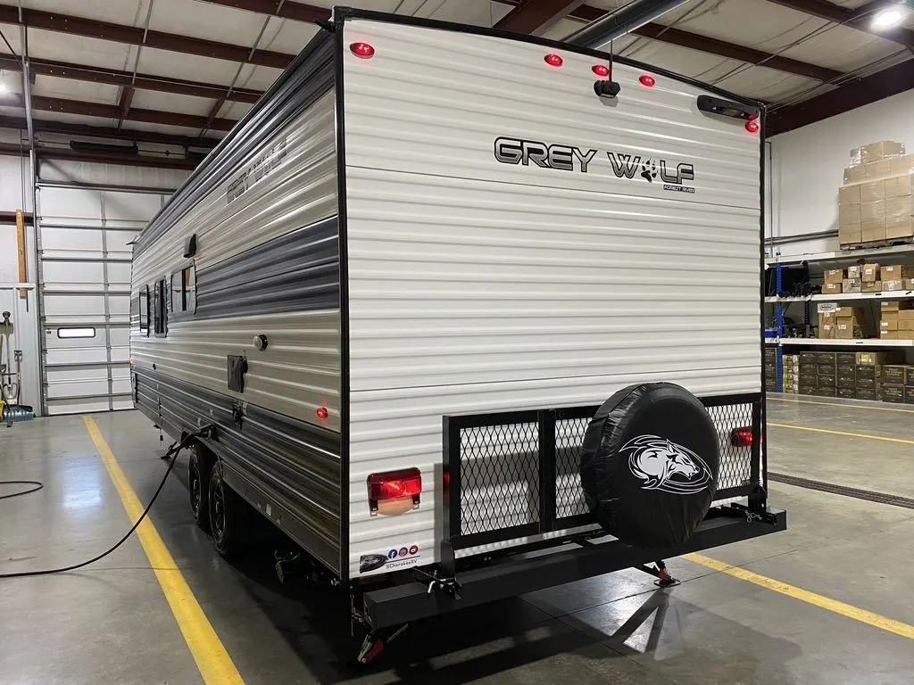 Rear view of the New 2024 Forest River Cherokee Grey Wolf 26DJSE Travel Trailer RV.