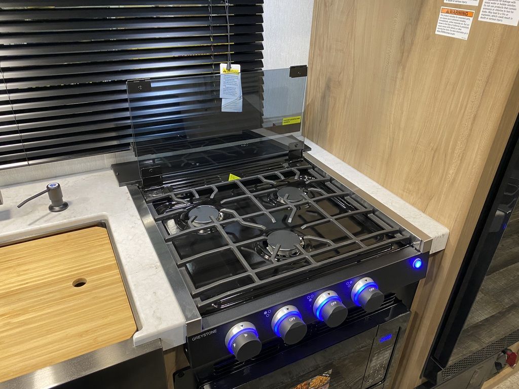 Kitchen with a gas range.