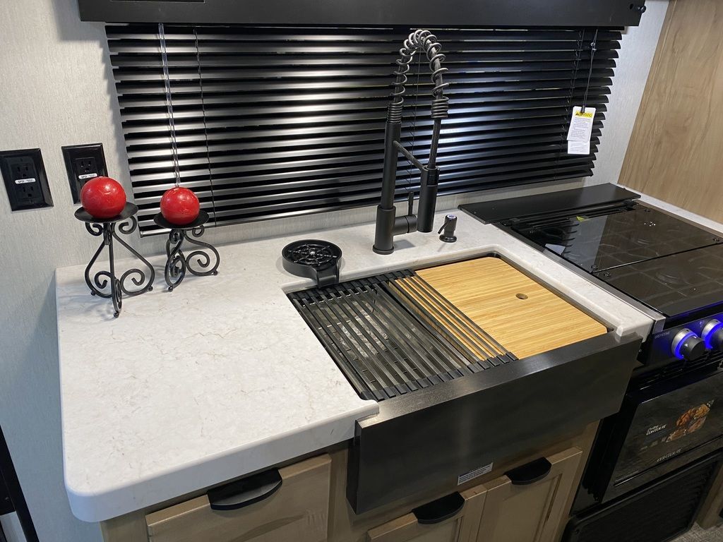 Kitchen with a gas range and a sink.