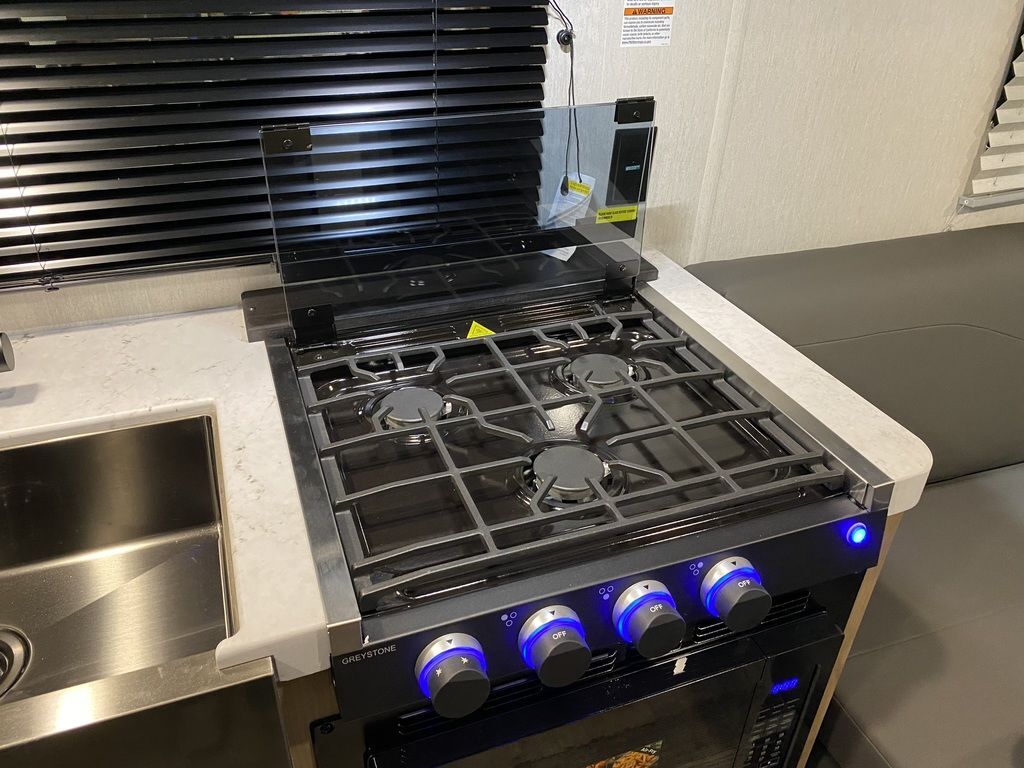 Kitchen with a gas range.