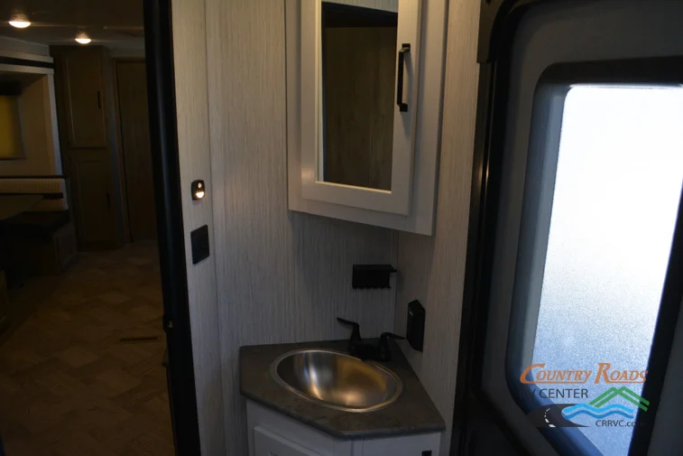 Bathroom with a sink and a medicine cabinet.