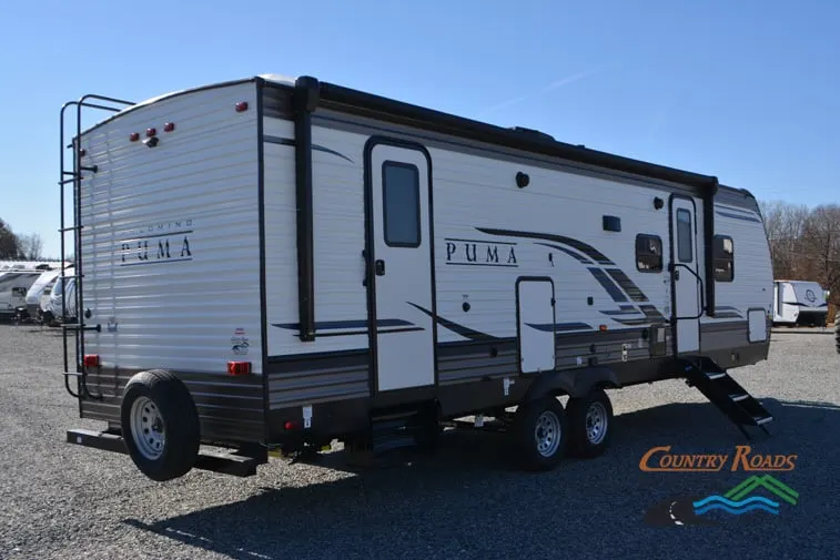 Side view of the New 2024 Palomino Puma 28DBFQ Travel Trailer RV.