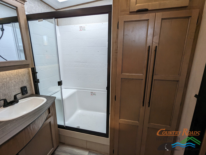 Bathroom with a walk-in shower.