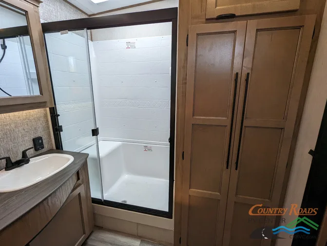 Bathroom with a walk-in shower.