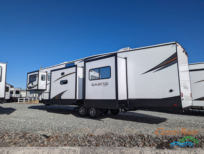 Side view of the New 2024 Forest River SABRE 37FLH Fifth Wheel RV.