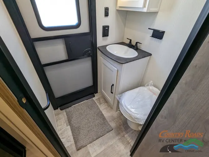 Bathroom with a sink and a toilet.