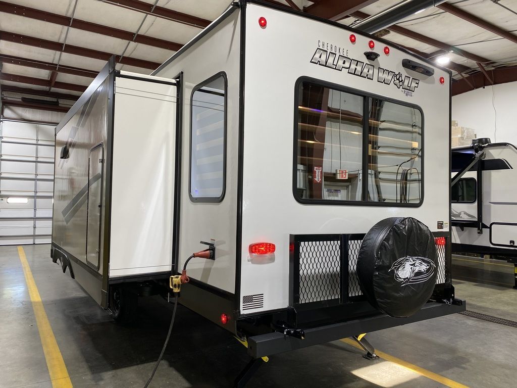 Rear view of the New 2024 Forest River Alpha Wolf 26RL-L Travel Trailer RV.