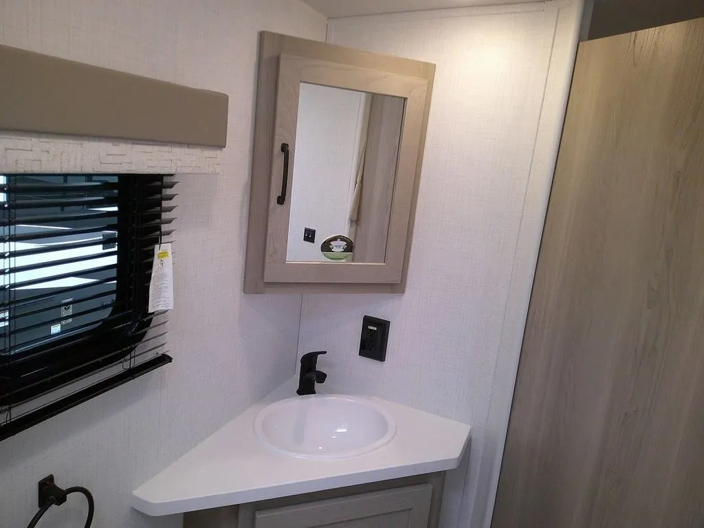 Bathroom with a sink and a medicine cabinet.