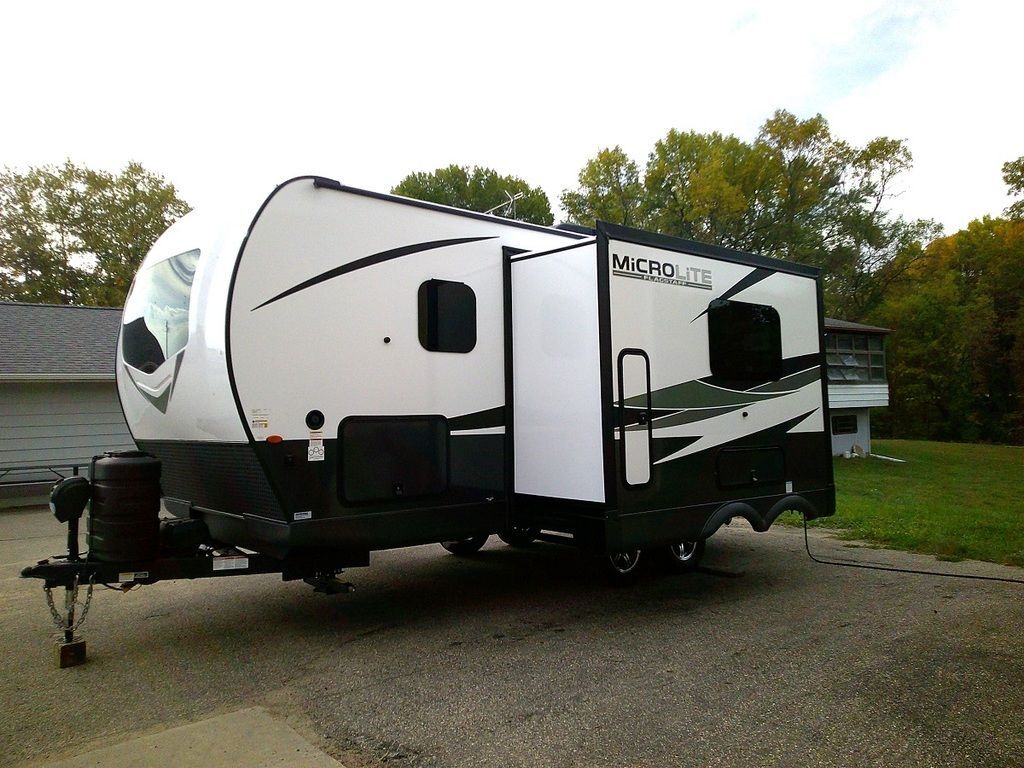 Side view of the New 2025 Forest River Flagstaff Micro Lite 22SQS Travel Trailer RV.