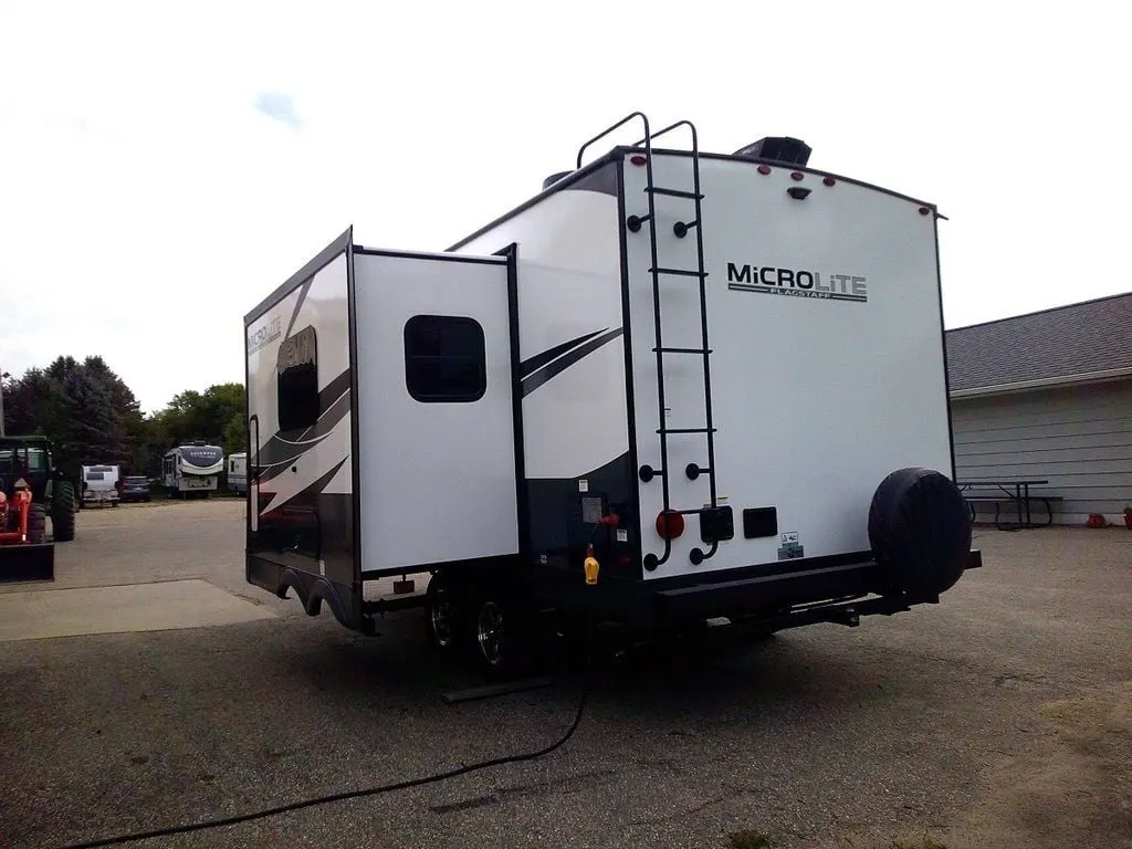 Rear view of the New 2025 Forest River Flagstaff Micro Lite 22SQS Travel Trailer RV.