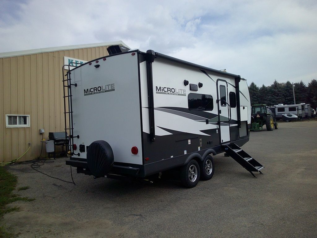 Side view of the New 2025 Forest River Flagstaff Micro Lite 22SQS Travel Trailer RV.