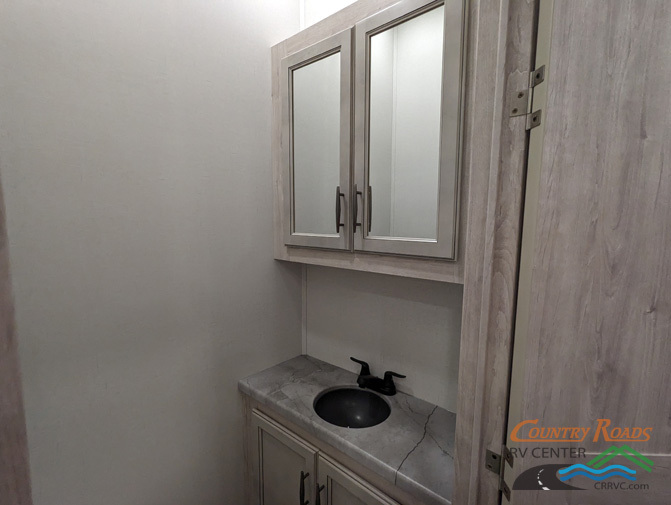 Bathroom with a sink and a medicine cabinet.