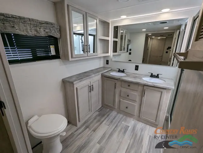 Bathroom with a sinks and a toilet.