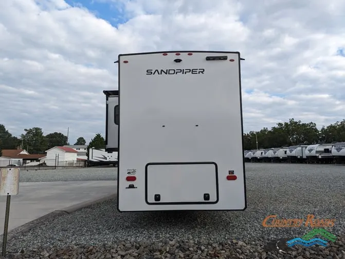 Rear view of the New 2024 Forest River SANDPIPER 391FLRB Fifth Wheel RV.