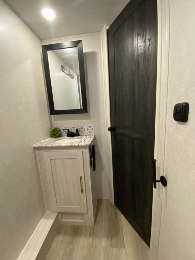 Bathroom with a sink and a medicine cabinet.