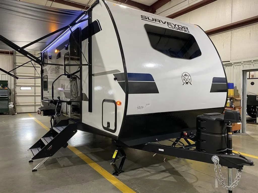 Side view of the New 2024 Forest River Surveyor Legend Sub 19MDBLE Travel Trailer RV.