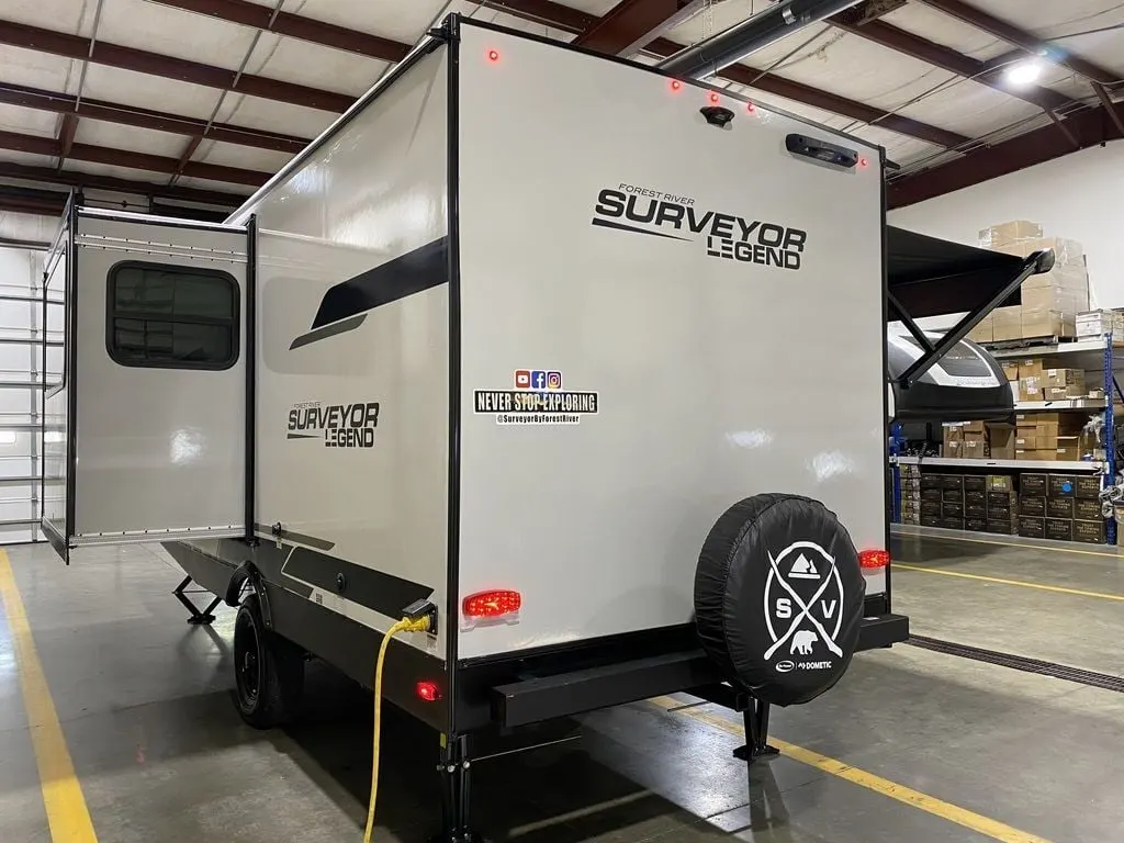 Rear view of the New 2024 Forest River Surveyor Legend Sub 19MDBLE Travel Trailer RV.