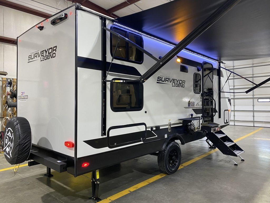 Side view of the New 2024 Forest River Surveyor Legend Sub 19MDBLE Travel Trailer RV.