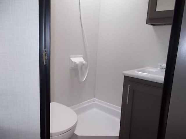 Bathroom with a toilet and a shower.