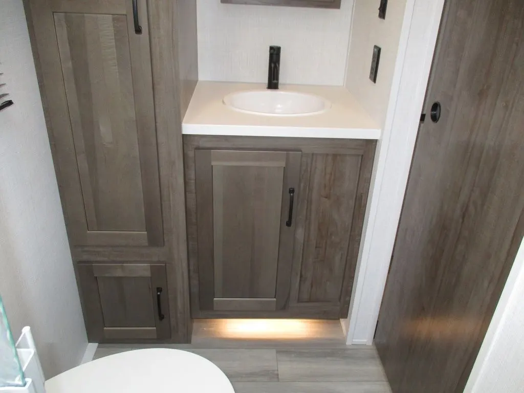 Bathroom with a sink and a linen.