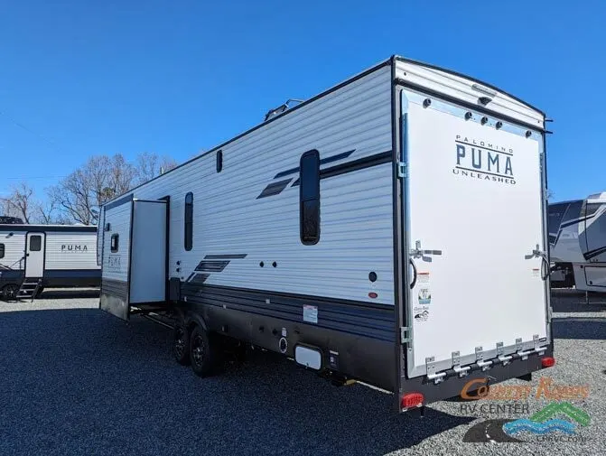 Side view of the New 2024 Palomino PUMA UNLEASHED 383DSS Fifth Wheel Toy Hauler RV.