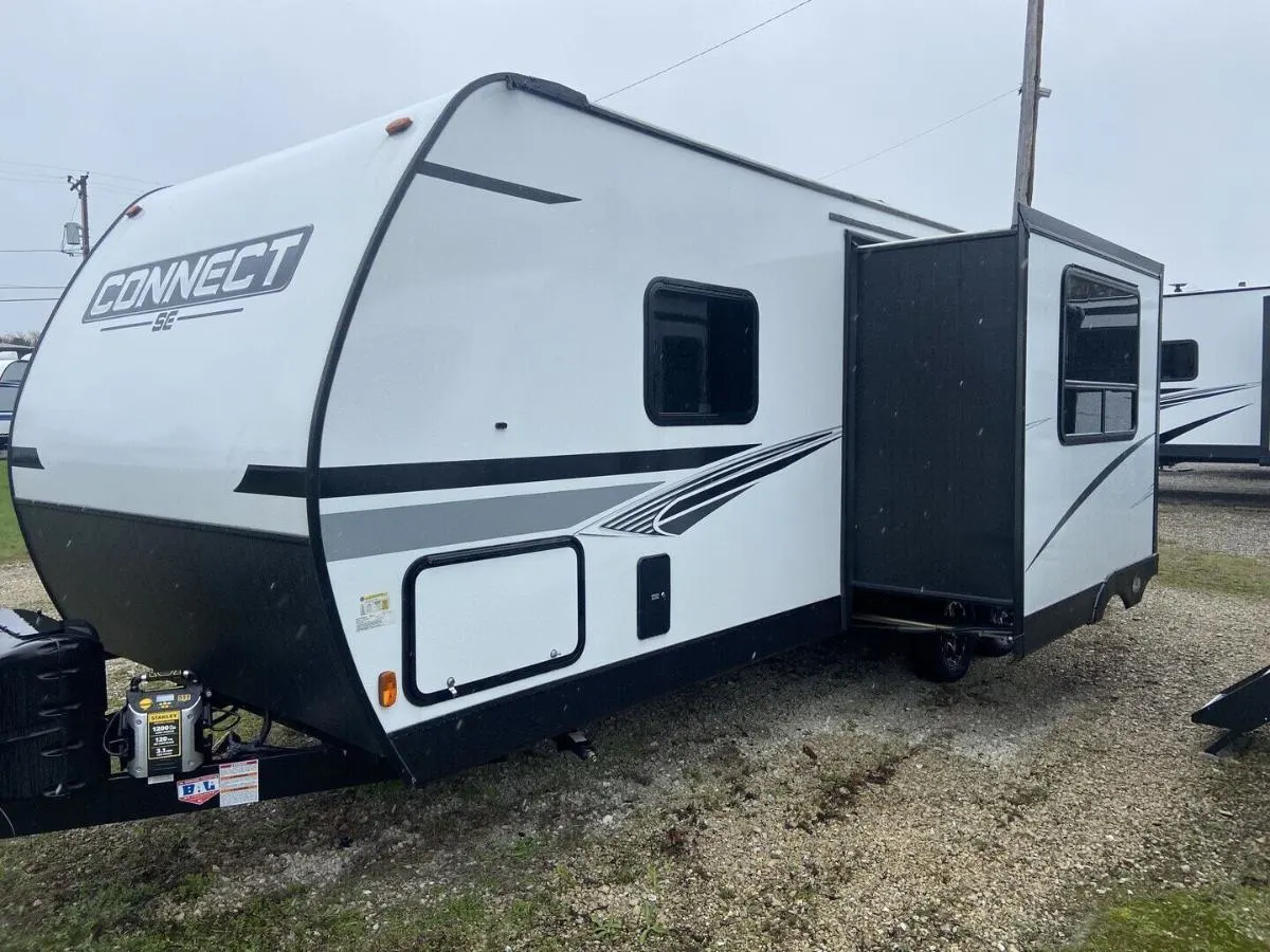 Side view of the RV with a slide out.