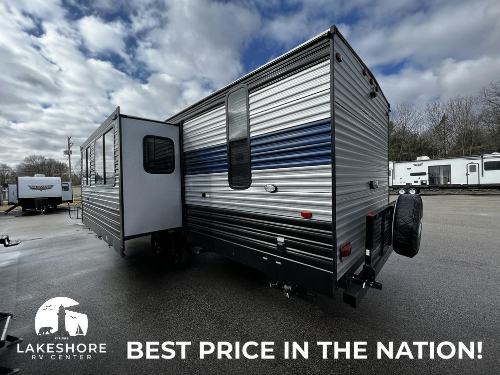 Side view of the New 2022 Forest River Cherokee 264DBH Travel Trailer RV.