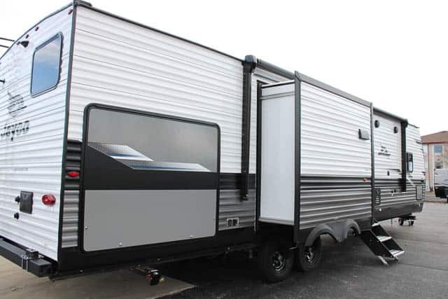 Side view of the New 2024 Jayco JAY FLIGHT 331BTS Travel Trailer RV.