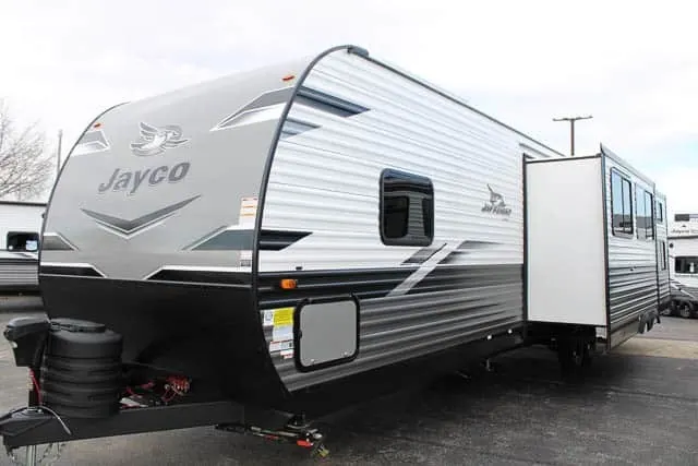 Side view of the New 2024 Jayco JAY FLIGHT 331BTS Travel Trailer RV.