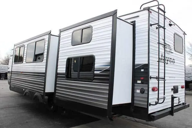 Side view of the New 2024 Jayco JAY FLIGHT 331BTS Travel Trailer RV.