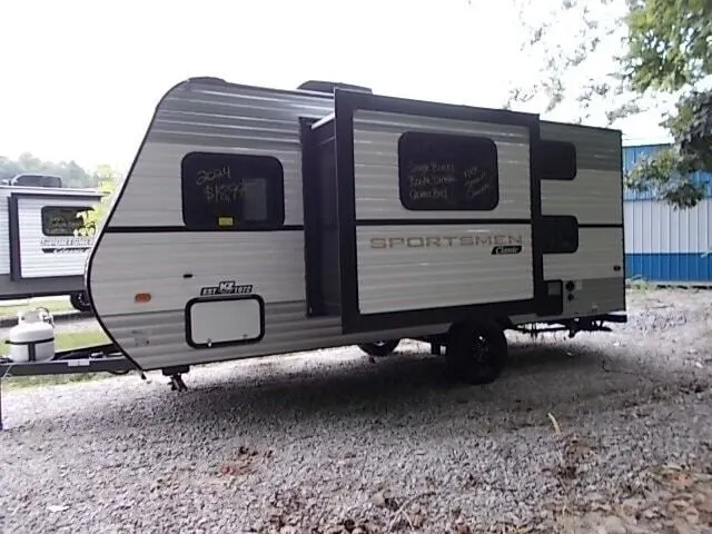 Side view of the New 2024 KZ RV Sportsmen Classic 181BH Travel Trailer RV.