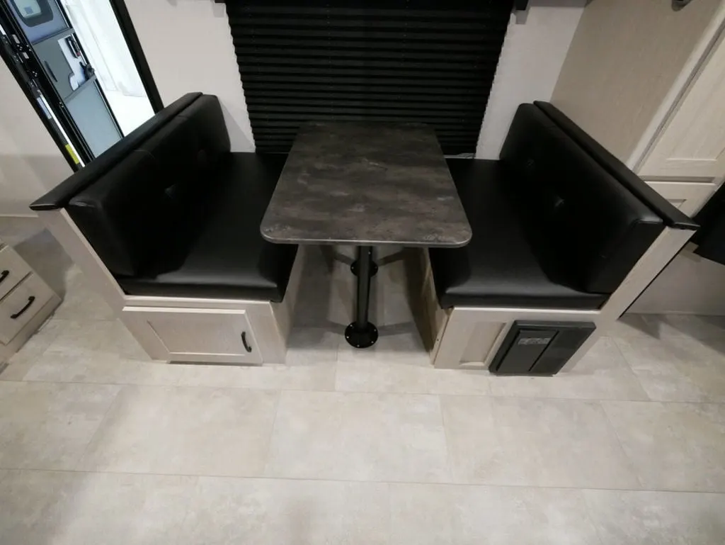 Dinette with pull-out storage drawers.