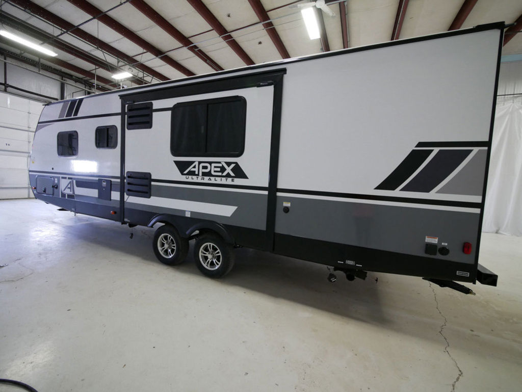 Side view of the New 2024 Coachmen Apex 256BHS Travel Trailer RV.