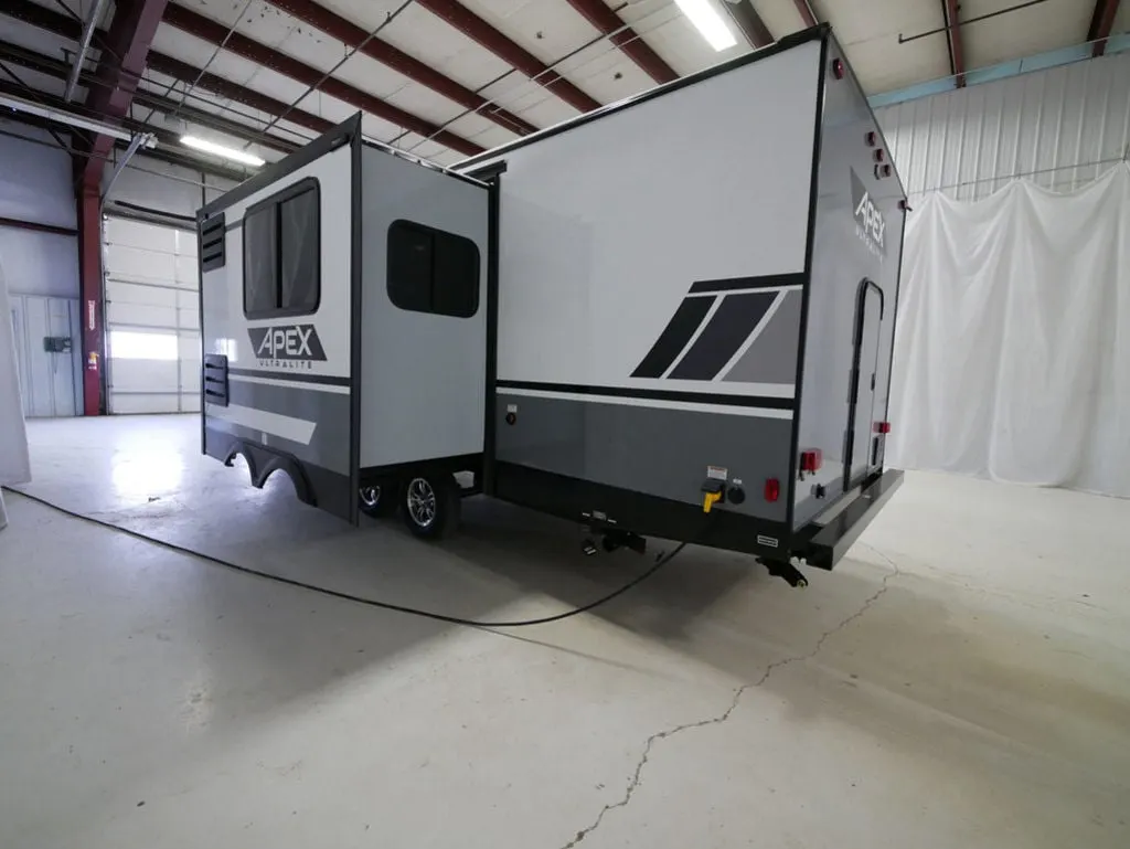 Side view of the New 2024 Coachmen Apex 256BHS Travel Trailer RV.