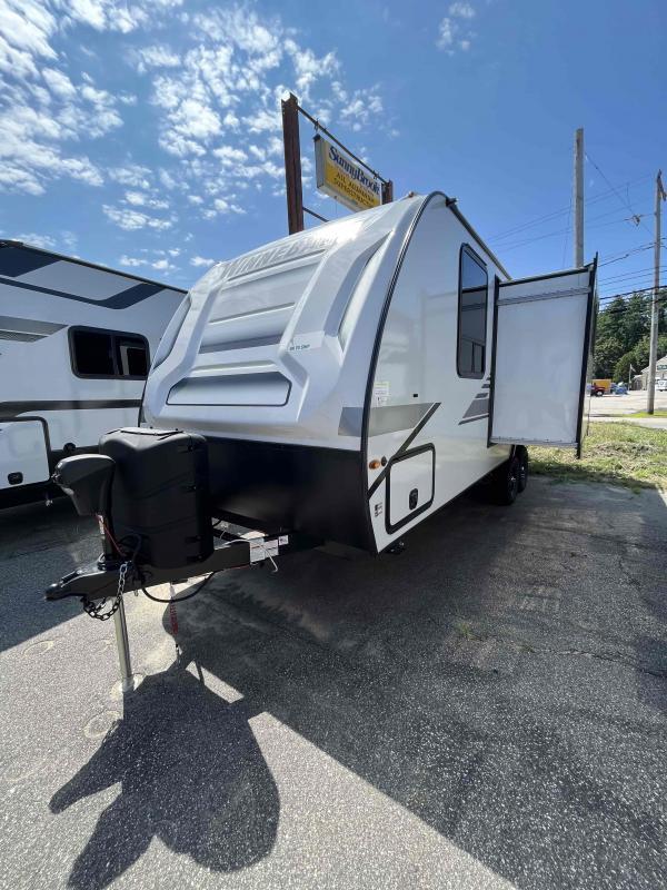 Side view of the RV with a slide out.