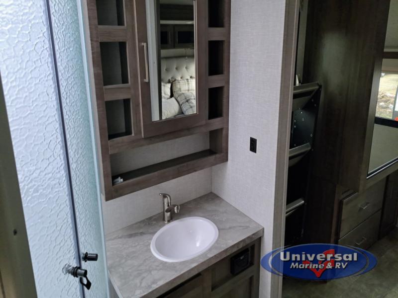 Bathroom with a sink and a walk-in shower.