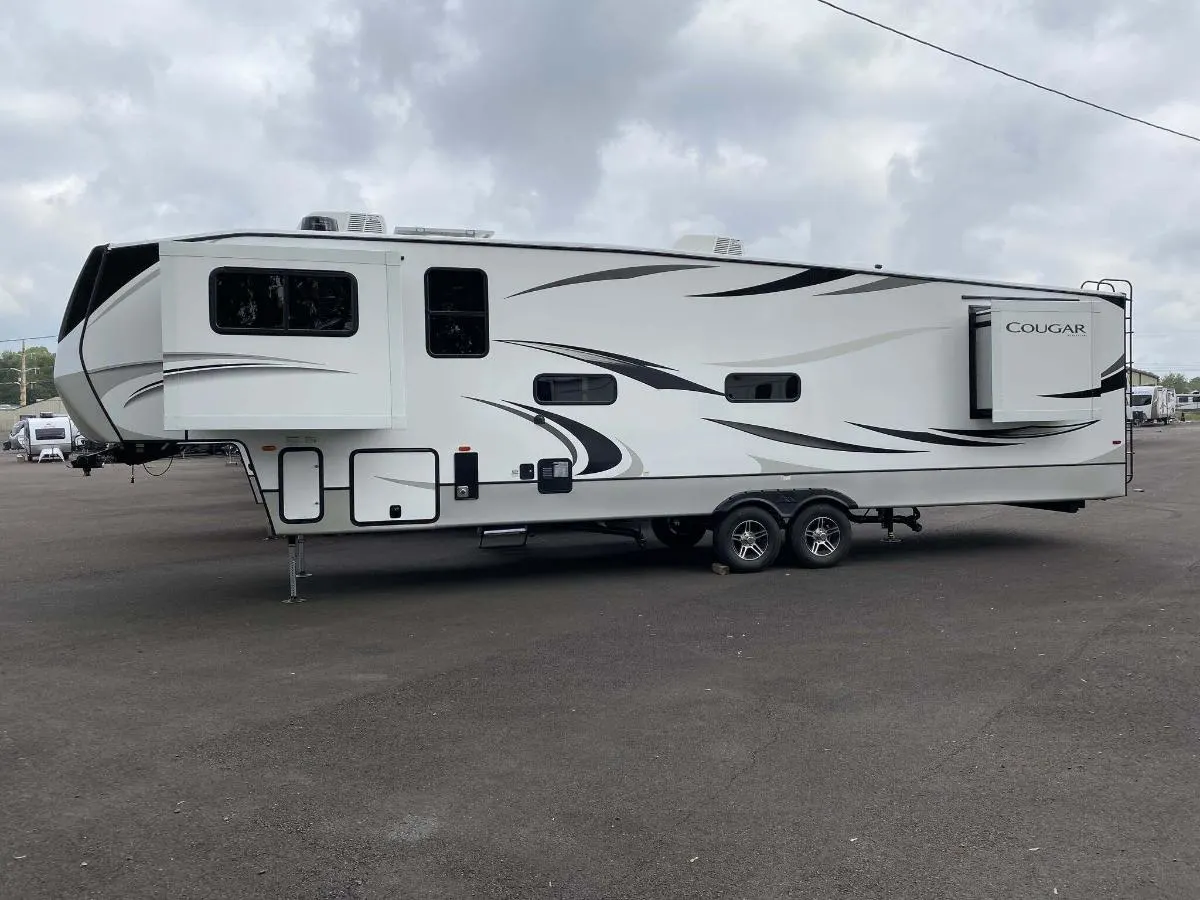 Side view of the New 2024 Keystone Cougar 354FLS Fifth Wheel RV.