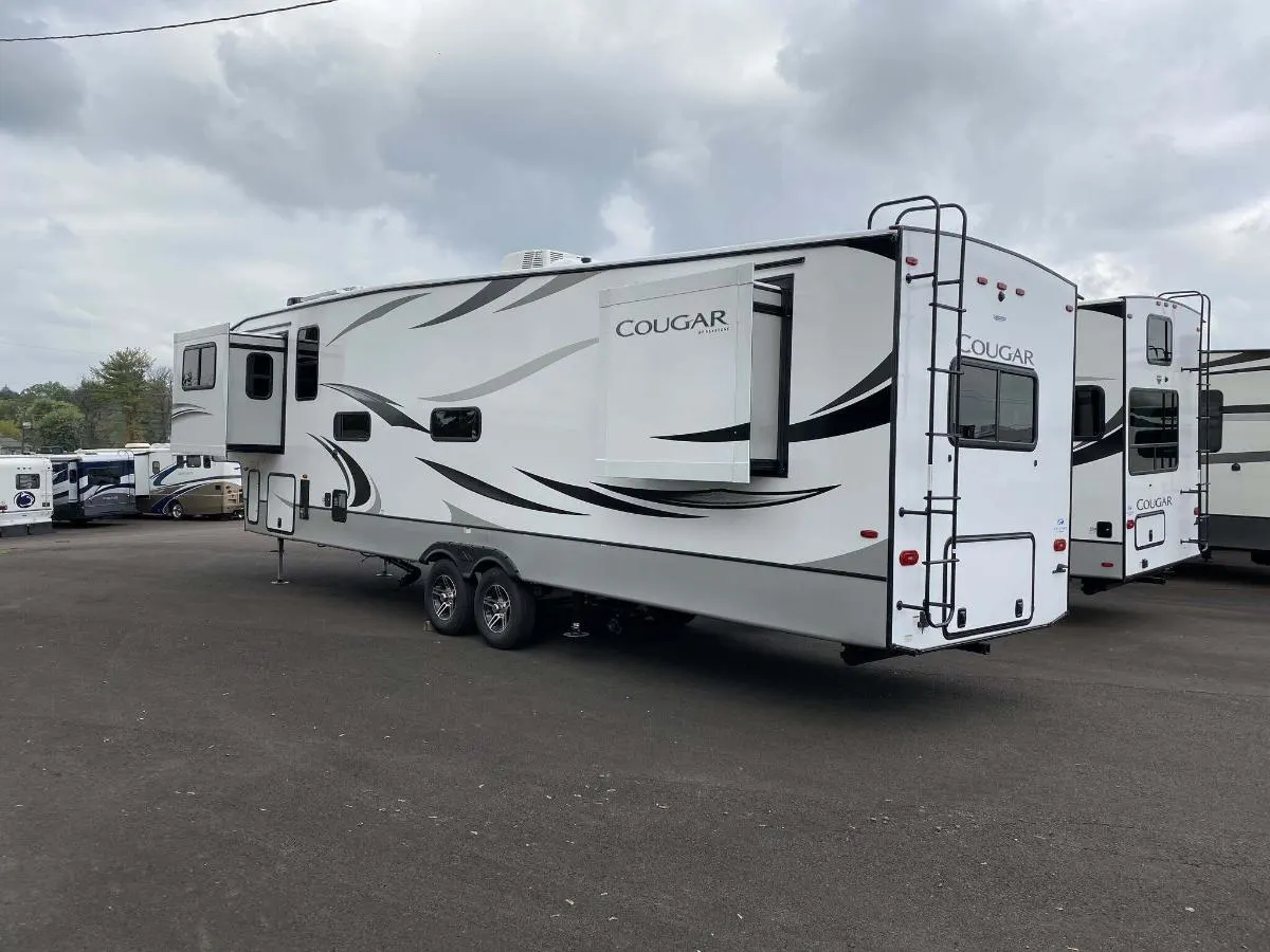 Side view of the New 2024 Keystone Cougar 354FLS Fifth Wheel RV.