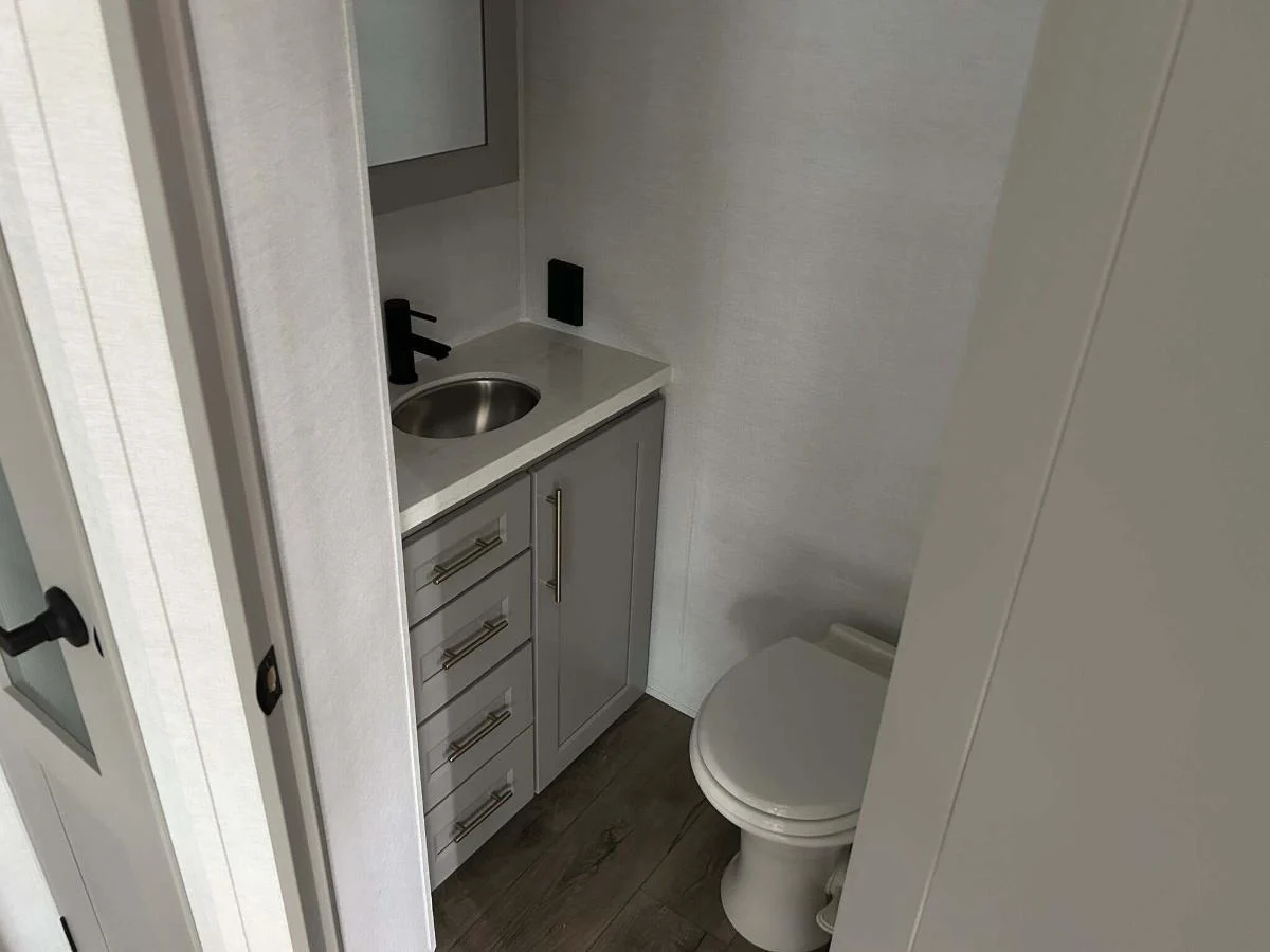 Bathroom with a sink and a toilet.