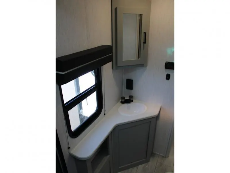 Bathroom with a sink and a medicine cabinet.