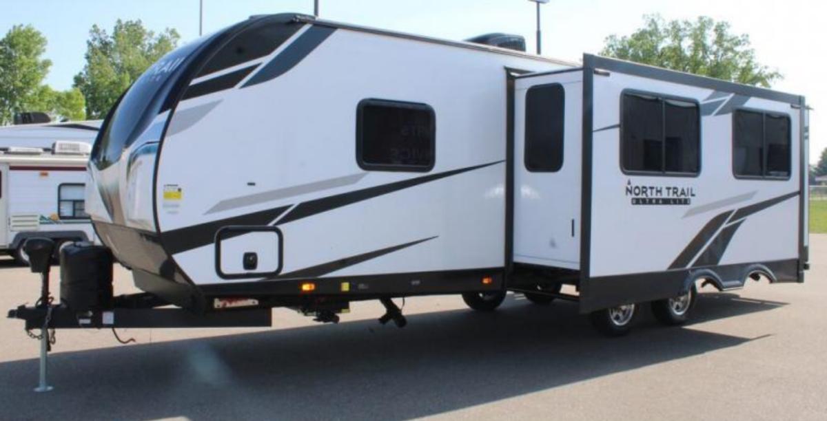 Side view of the RV with a slide out.