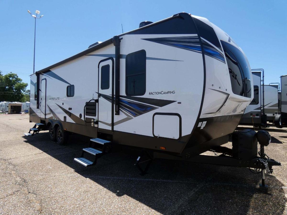 Side view of the New 2022 Forest River XLR Hyperlite 3212 Toy Hauler RV.