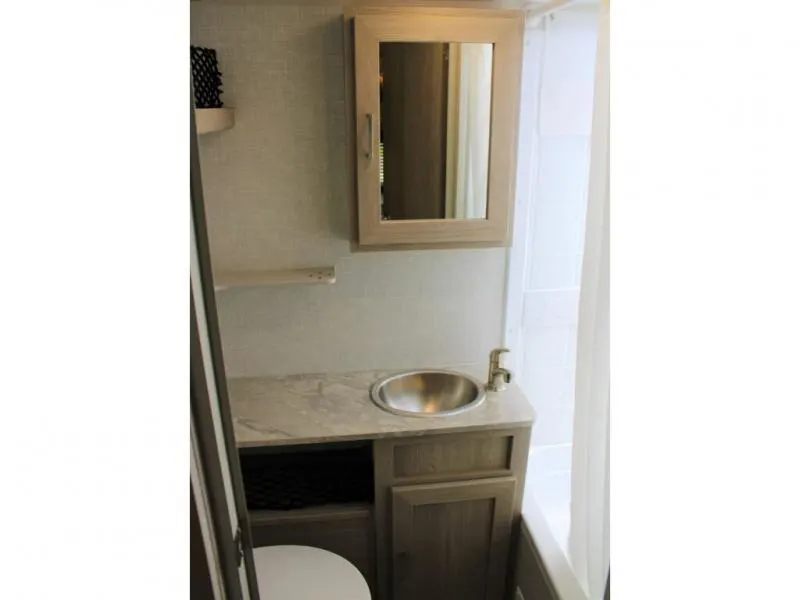 Bathroom with a sink and a medicine cabinet.