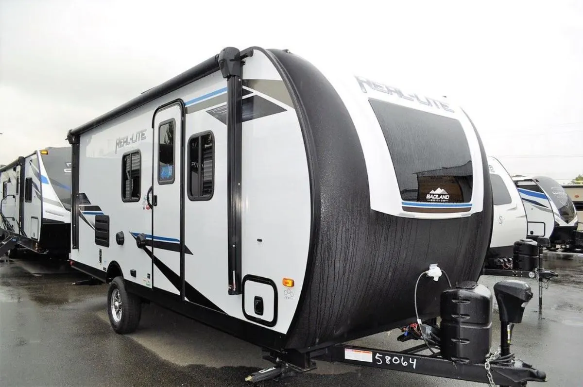 Side view of the New 2022 Palomino Real-Lite Mini RL189 Travel Trailer RV.