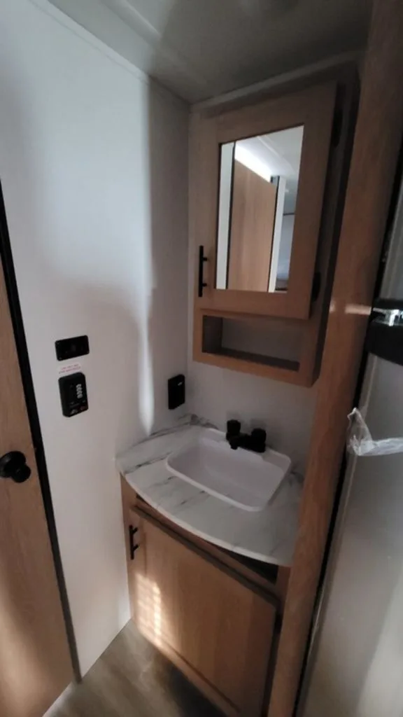 Bathroom with a sink and a medicine cabinet.