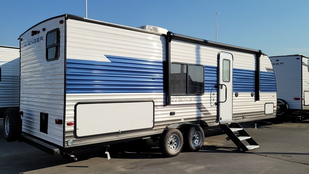 Side view of the New 2022 Prime Time Avenger 26BK Travel Trailer RV.