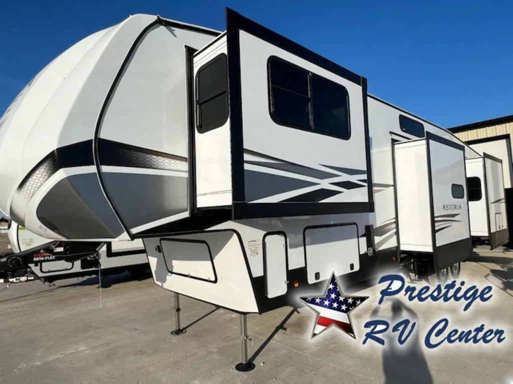 Side view of the New 2024 Dutchmen Astoria Platinum 3803FLP Fifth Wheel RV.