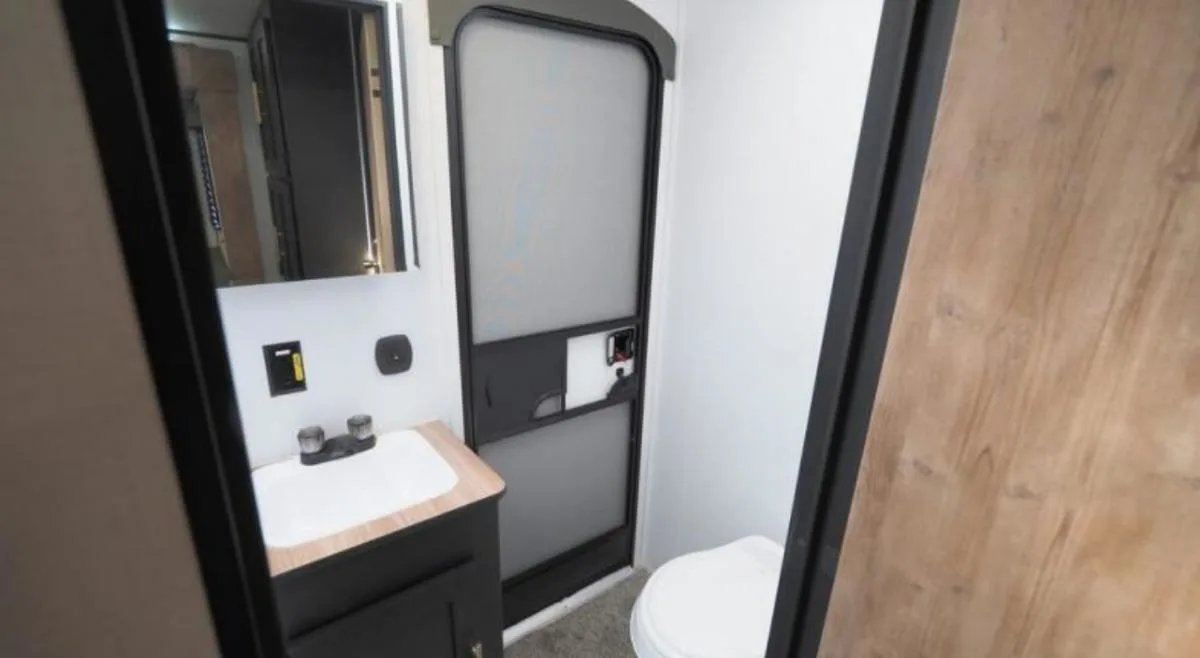 Bathroom with a sink and a toilet.