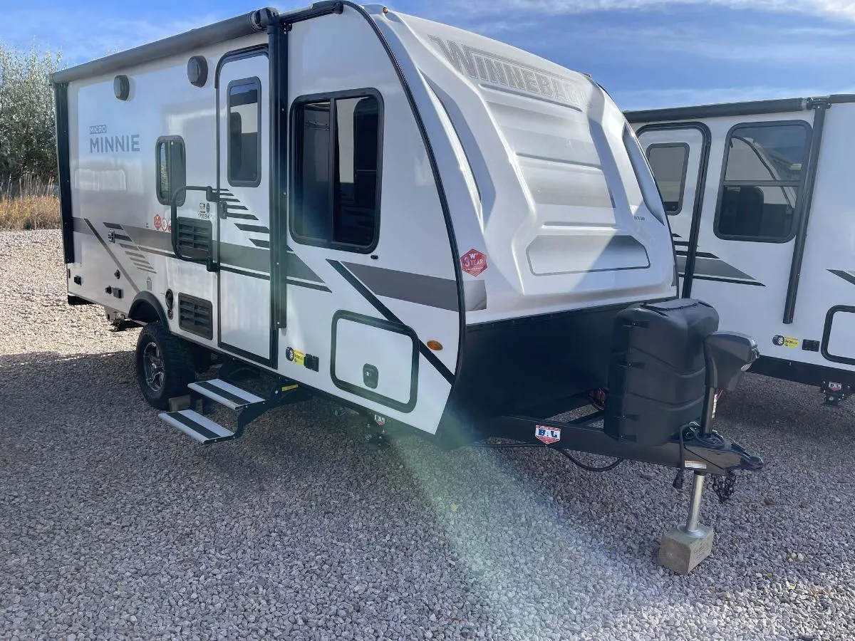 Side view of the New 2022 Winnebago Micro Minnie 1700BH Travel Trailer RV.