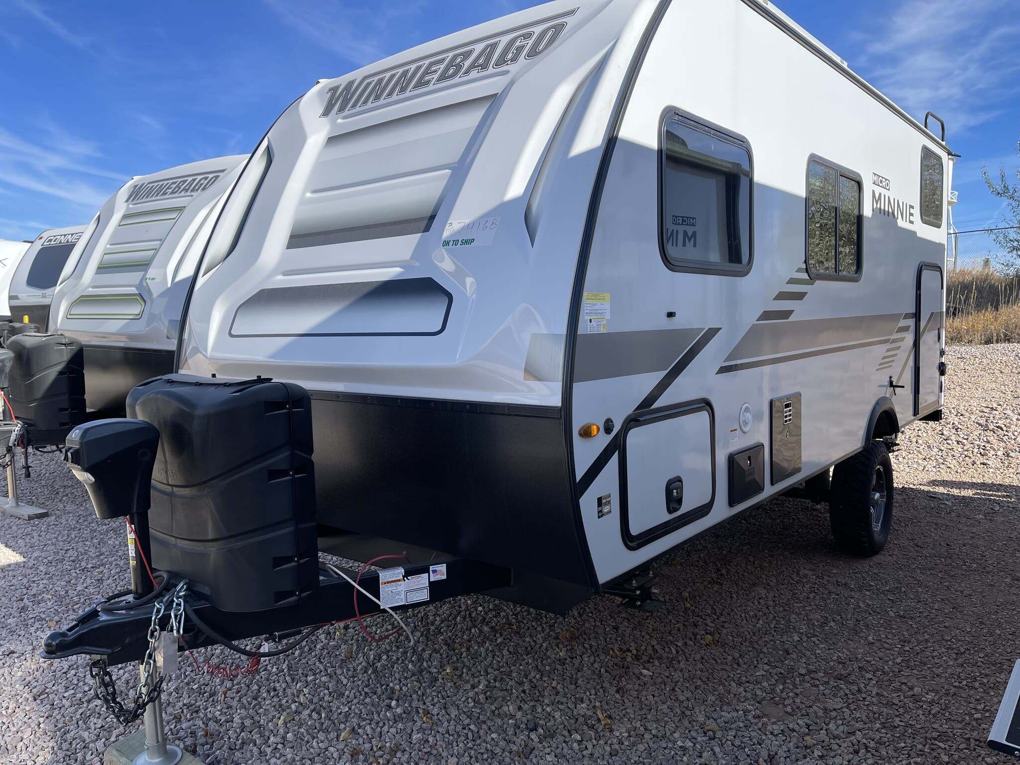 Side view of the New 2022 Winnebago Micro Minnie 1700BH Travel Trailer RV.